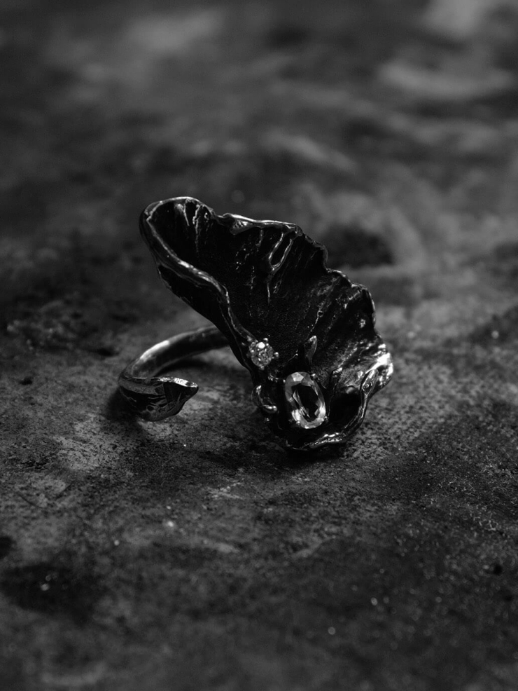 Black shimmering ring