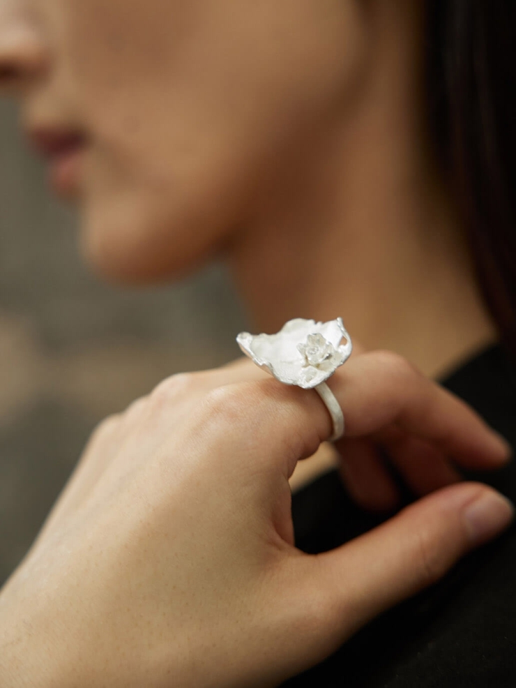 White large petal ring inlaid with zircon