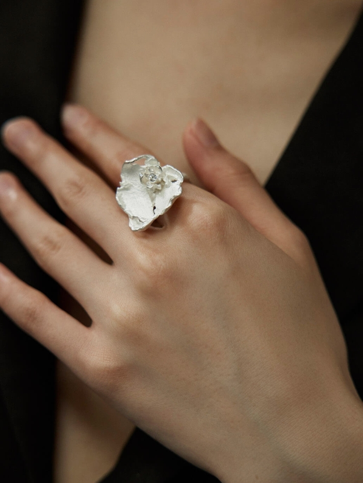 White large petal ring inlaid with zircon
