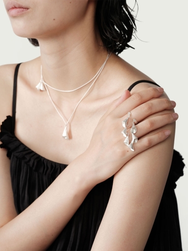 Silver rings with strings of bells