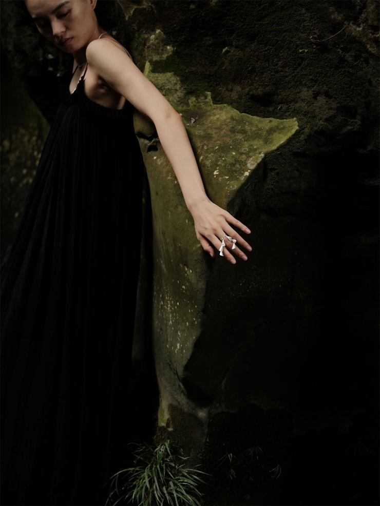 Silver rings with strings of bells