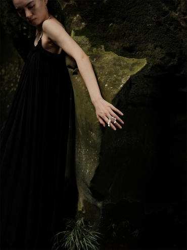 Silver rings with strings of bells