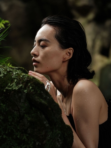 Silver rings with strings of bells