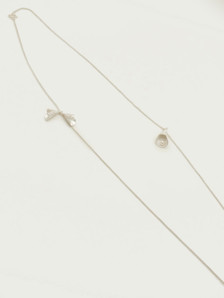 Decorated bells necklace