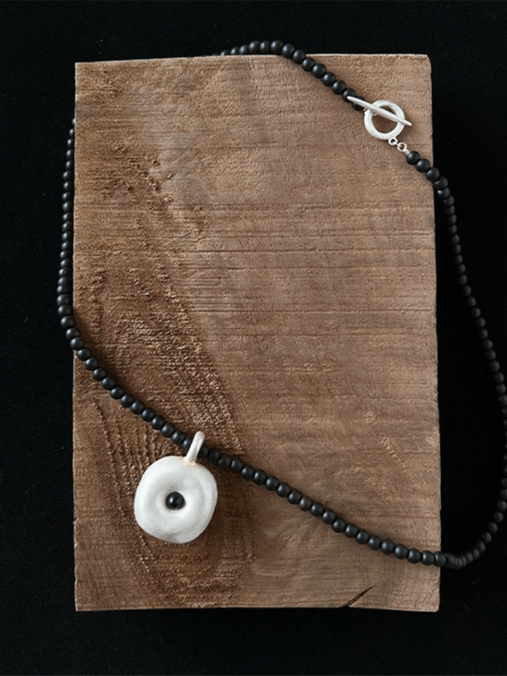 Ebony tree hollow pendant necklace