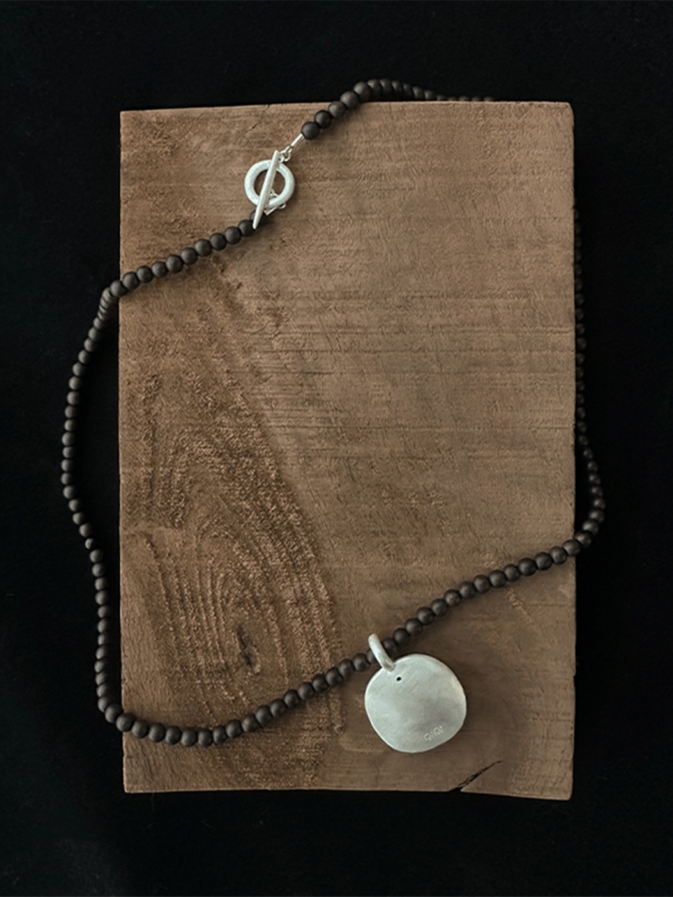 Ebony tree hollow pendant necklace