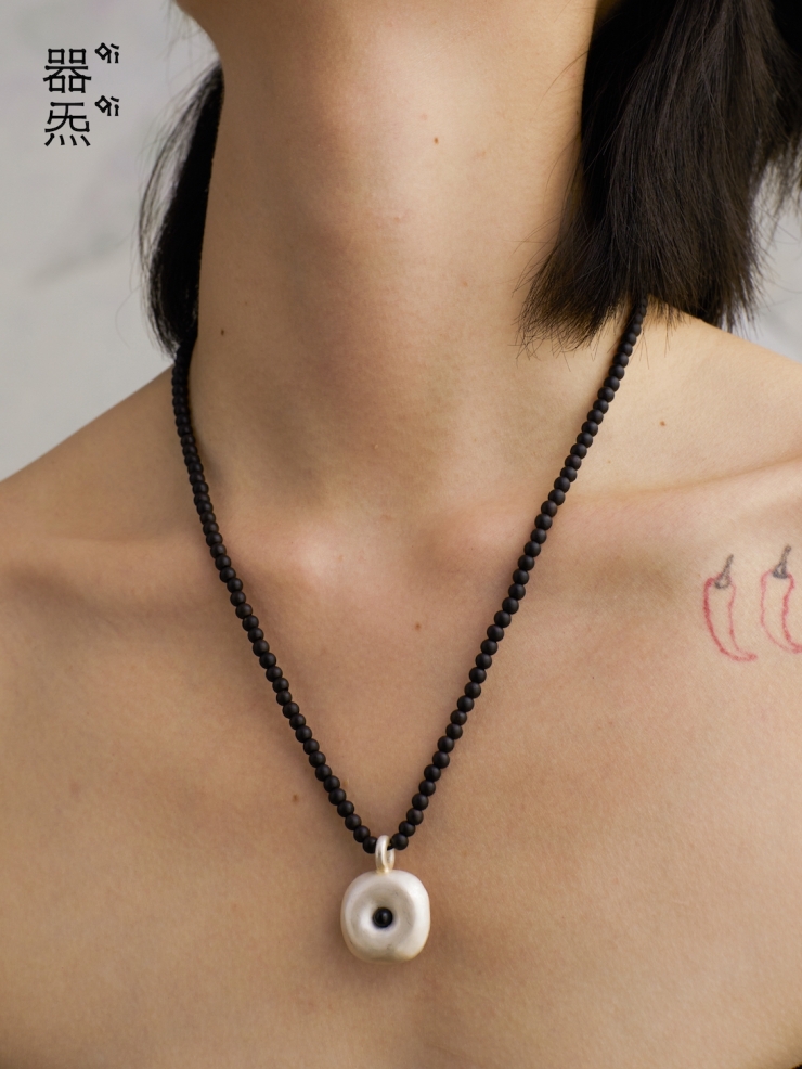 Ebony tree hollow pendant necklace