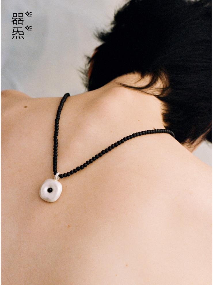 Ebony tree hollow pendant necklace