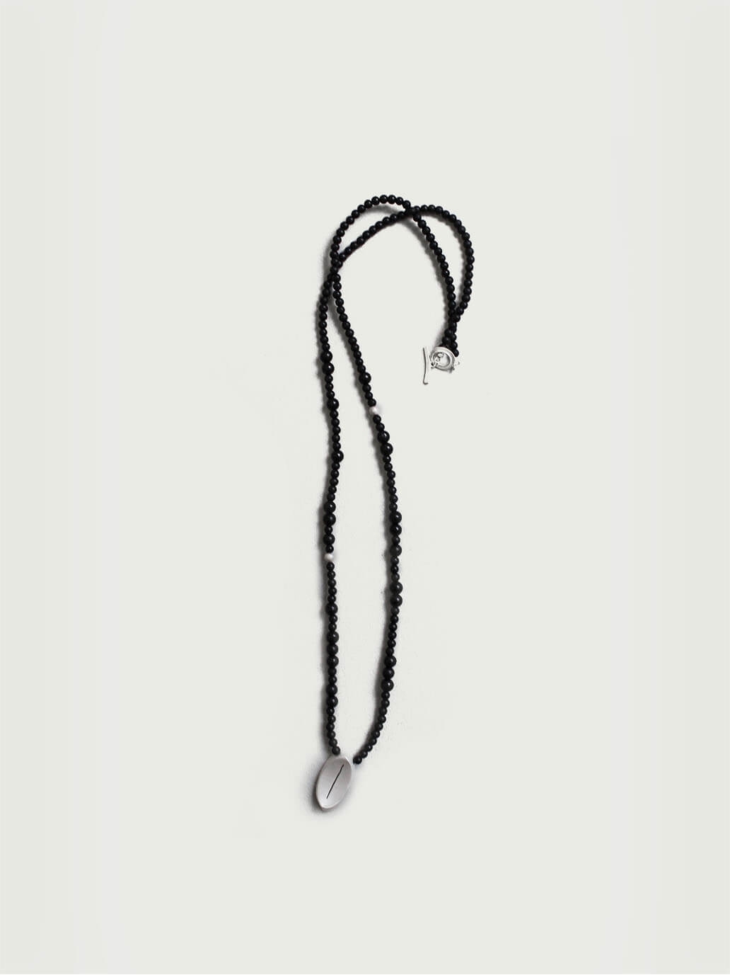 Silver and black fissure necklace