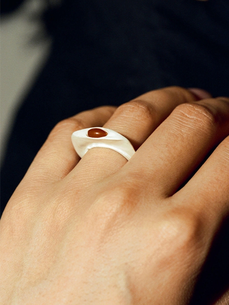 Silver and red wafer amber ring