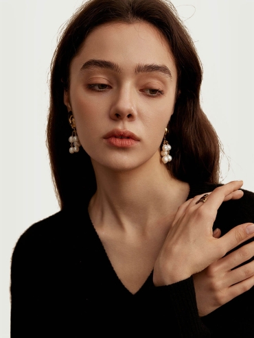 Gold Rotating Rock Pearl Earrings