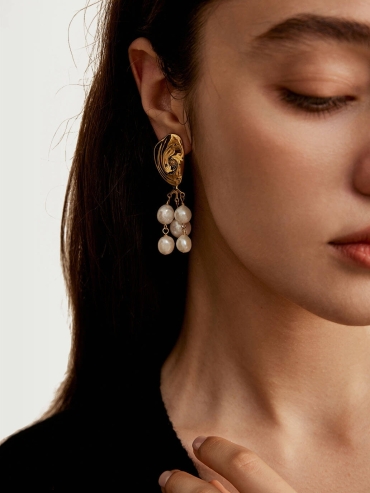 Gold Rotating Rock Pearl Earrings