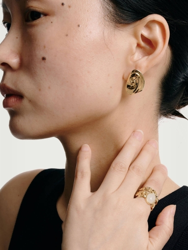 Gold Rotating Rock Studs