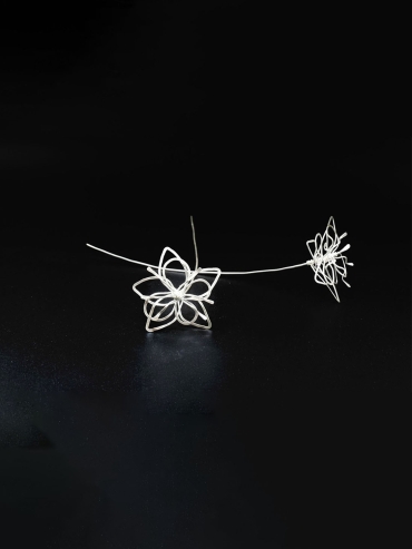 GUAN spiral flower shaped earrings