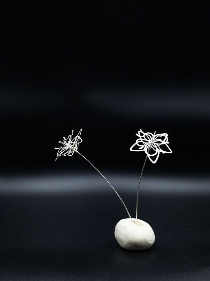 GUAN spiral flower shaped earrings