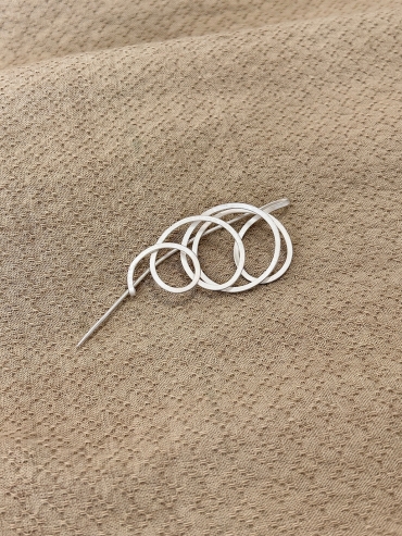 GUAN - spiral brooch