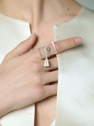 White flowing bell ring