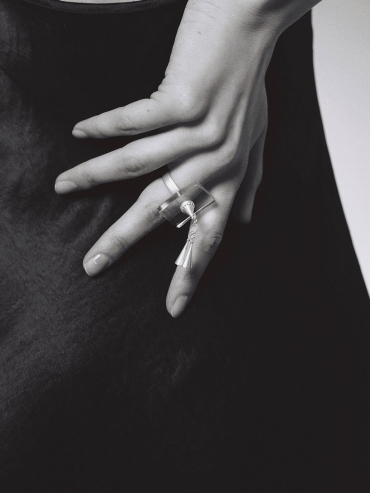 White flowing bell ring