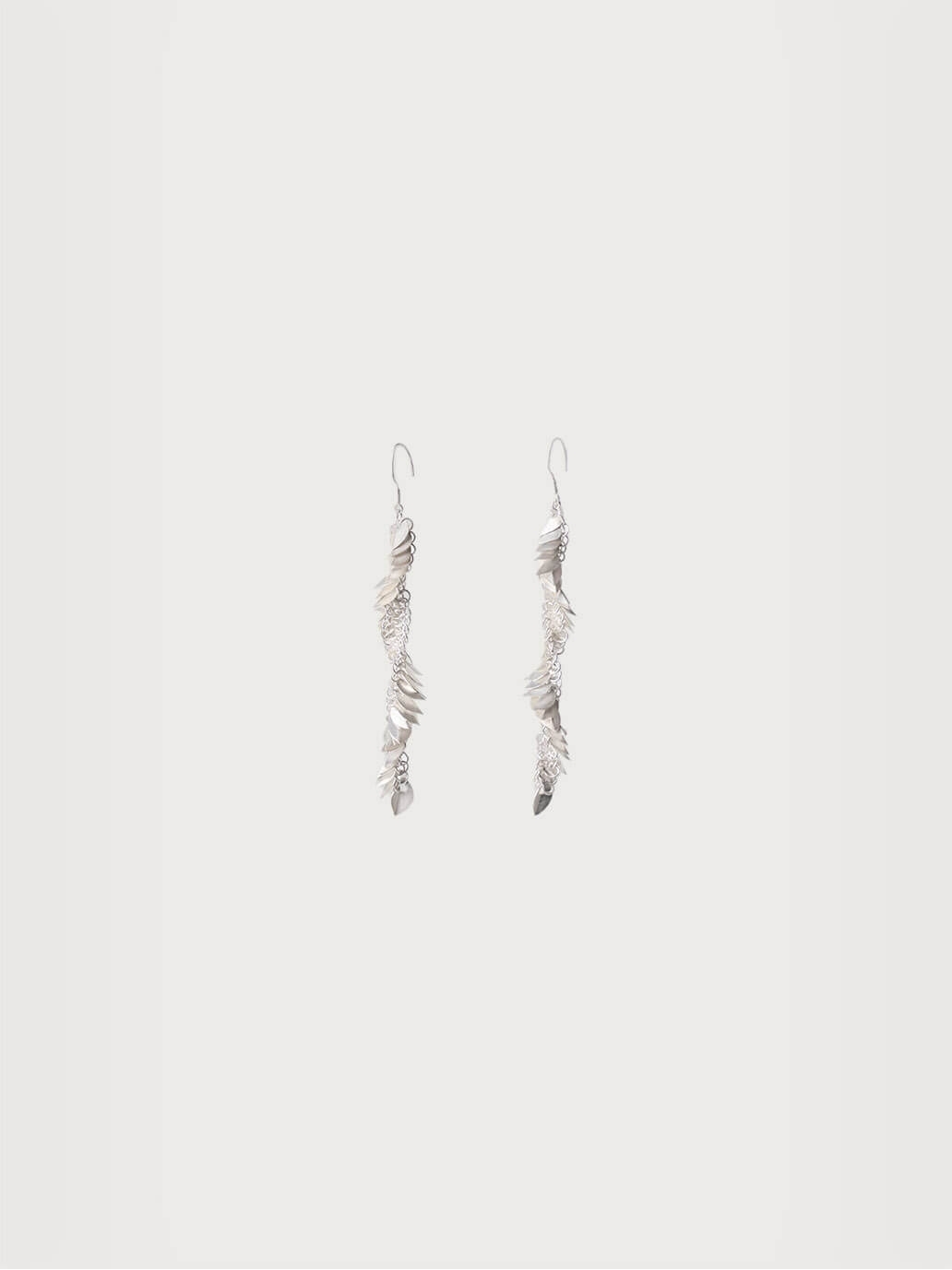 White scale pattern earrings