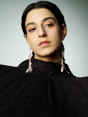 White scale pattern earrings