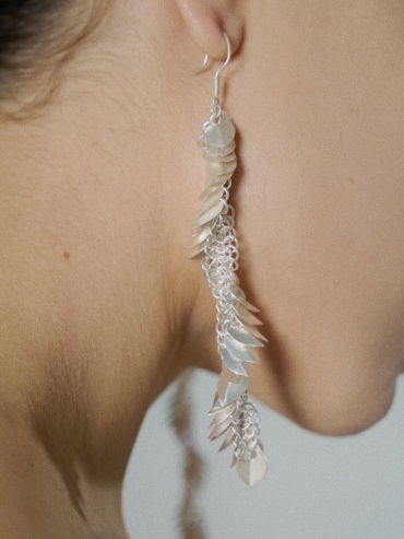 White scale pattern earrings