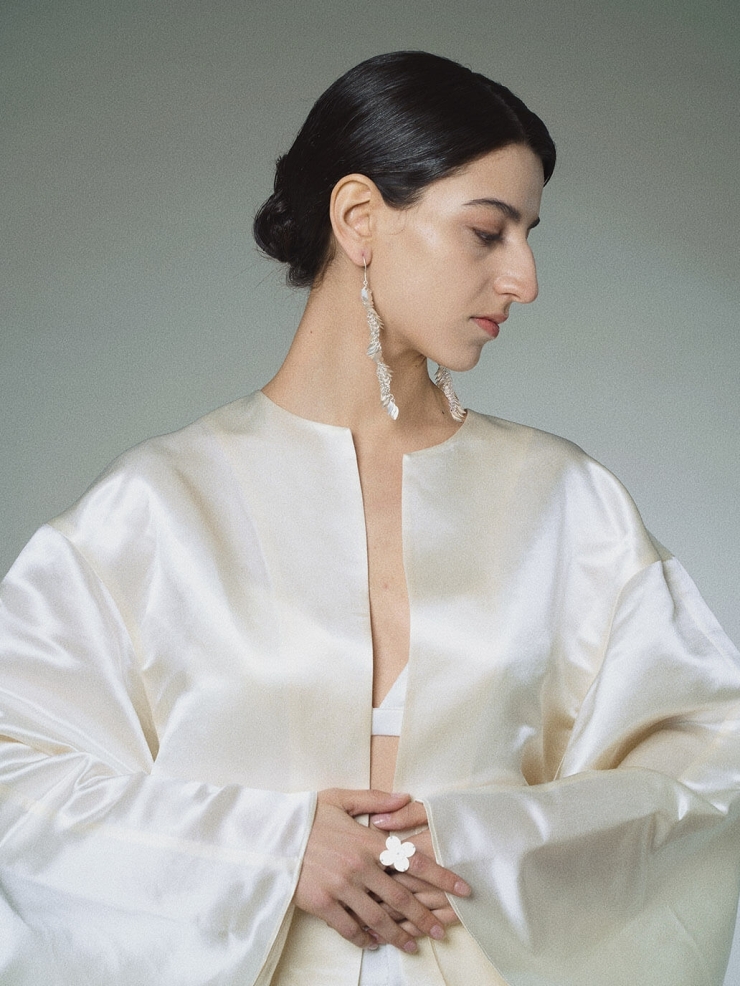 White scale pattern earrings