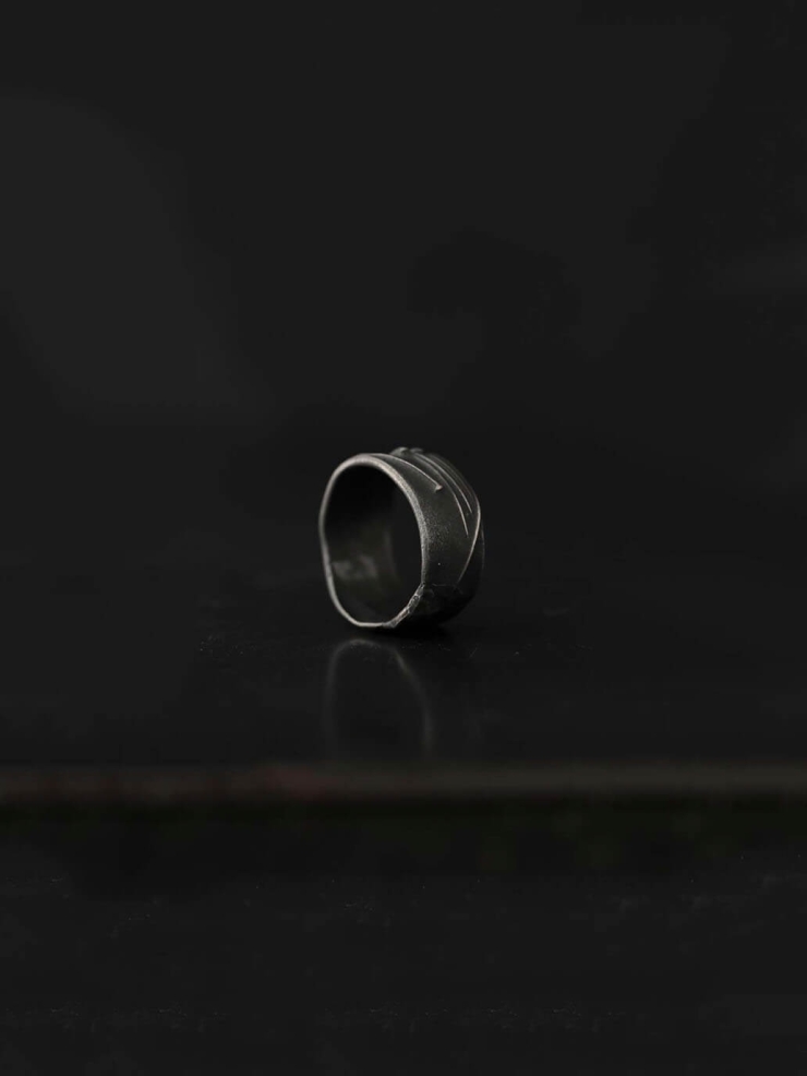 Black pin ring