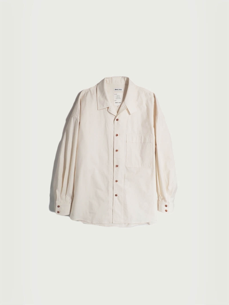 White shirt with a tailored stand collar and reversible lapel