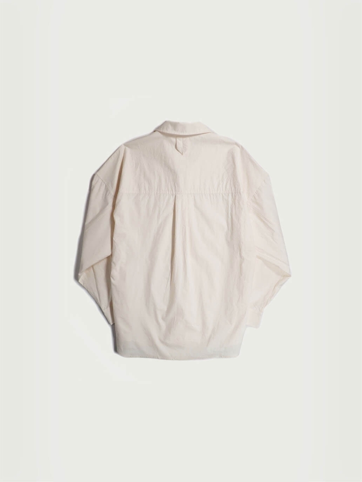 White shirt with a tailored stand collar and reversible lapel