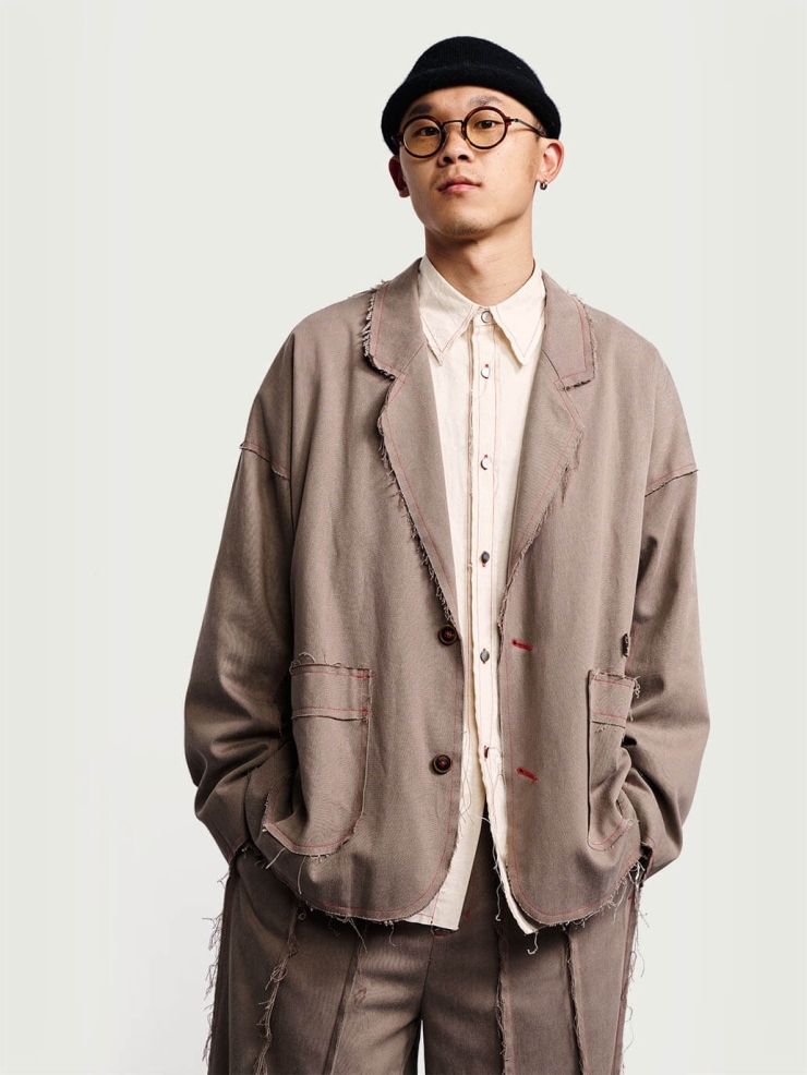 Brown fringed tailored suit