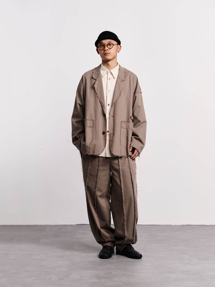 Brown fringed tailored suit