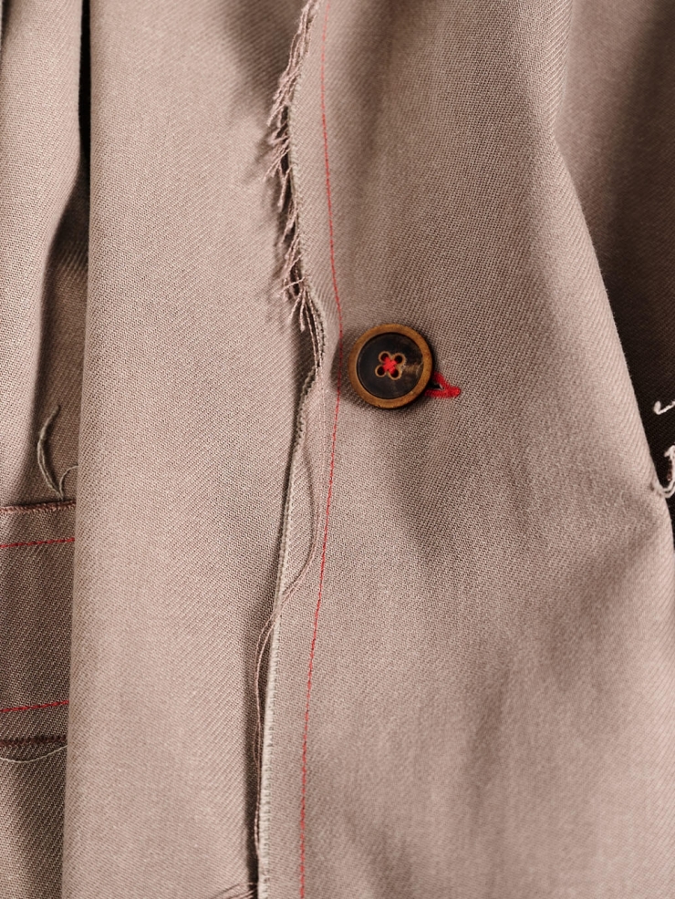 Brown fringed tailored suit