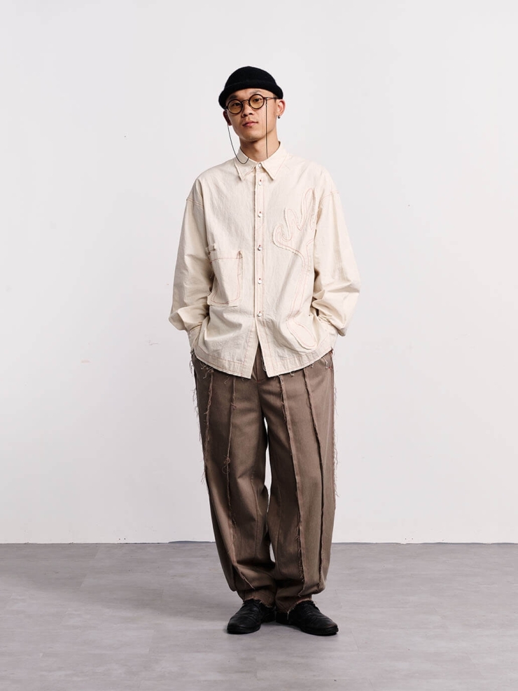 Brown fringed patchwork trousers