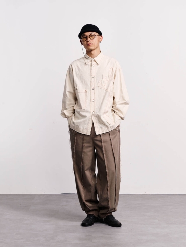 Brown fringed patchwork trousers