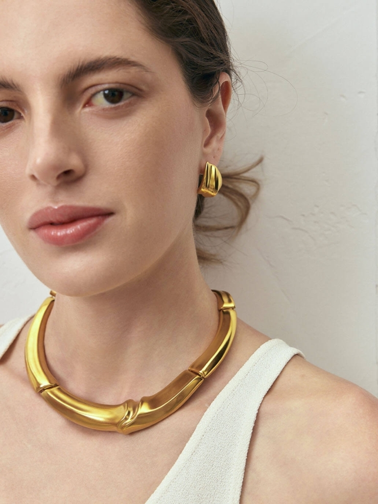 Gold Colored Interlocking Stud Earrings