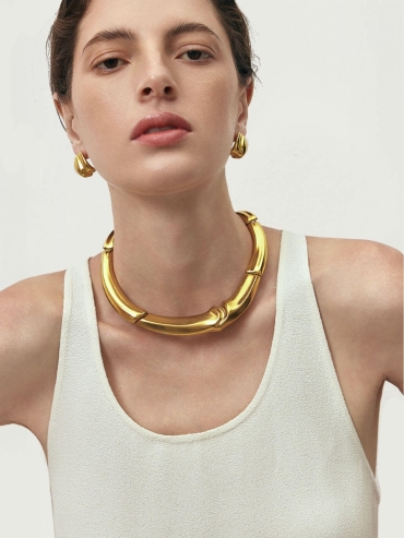 Gold Colored Interlocking Stud Earrings