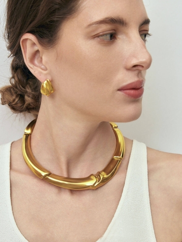 Gold Colored Interlocking Stud Earrings