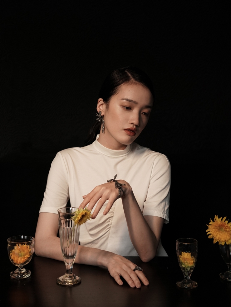 Black Wind Eroded Sunflower Earrings