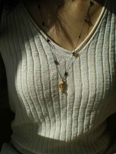 Gold Hand-Shaped Pearl Braided Necklace