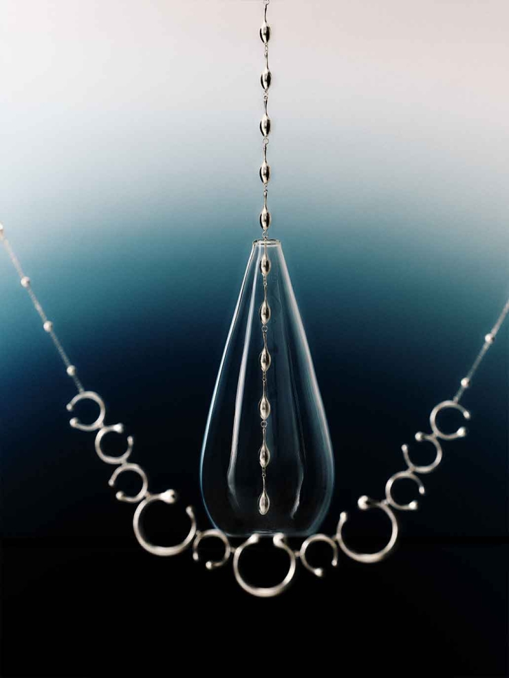 Silver Atomic Falling Teardrop Necklace