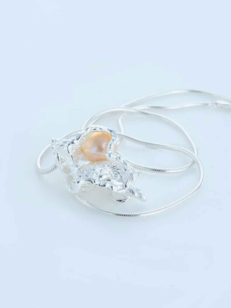 The Fluent Arc White Frozen Flow Necklace