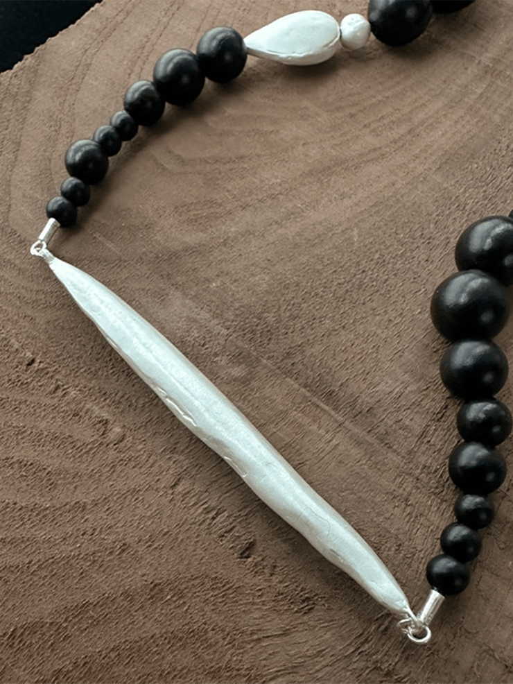 Ebony beading collar with sprout and seeds