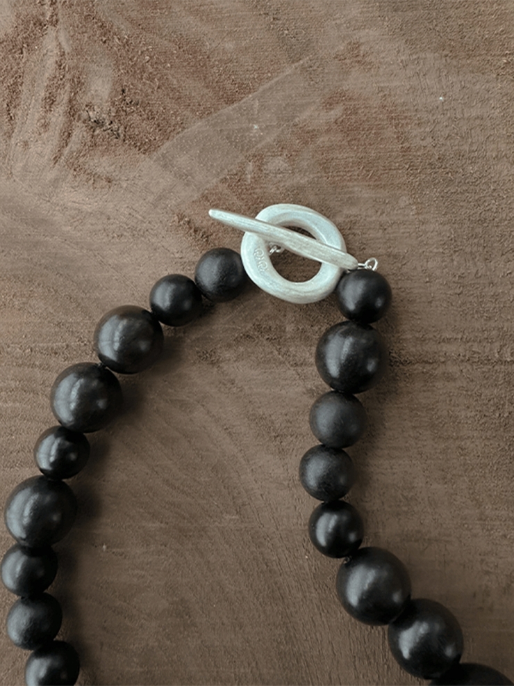 Ebony beading collar with sprout and seeds