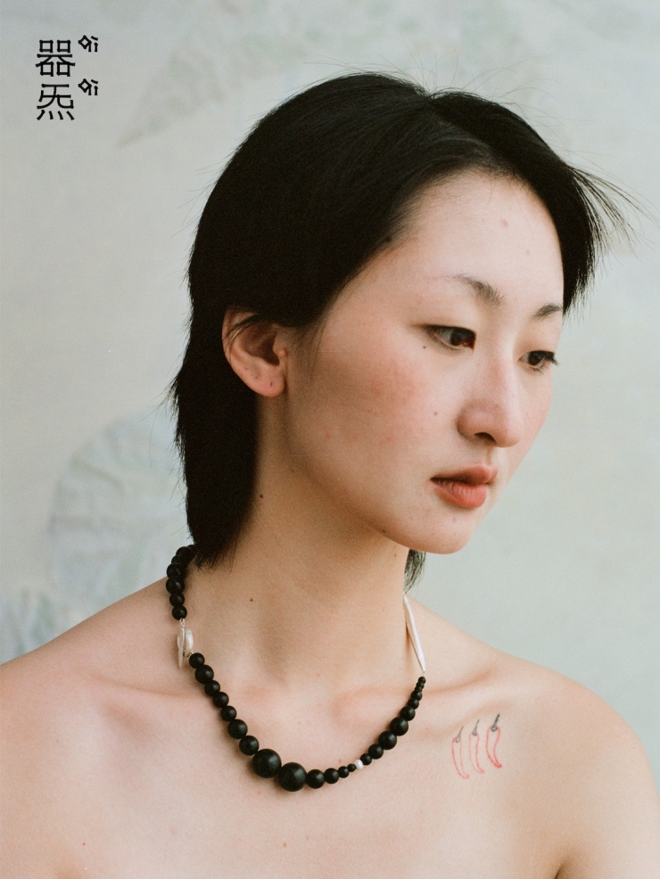 Ebony beading collar with sprout and seeds