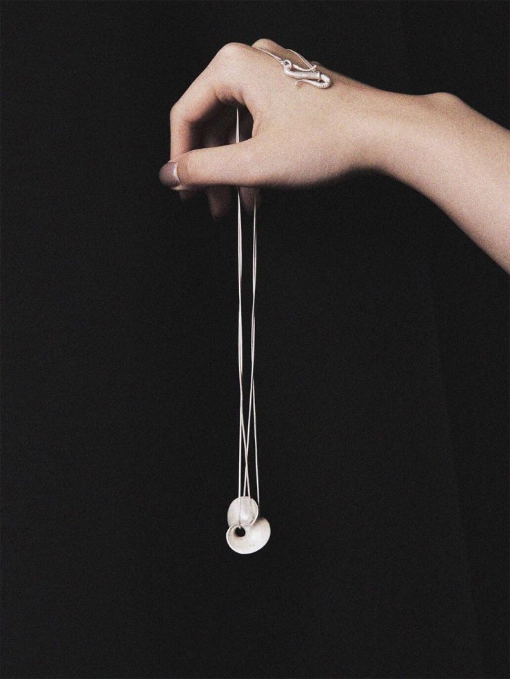 White wormhole necklace