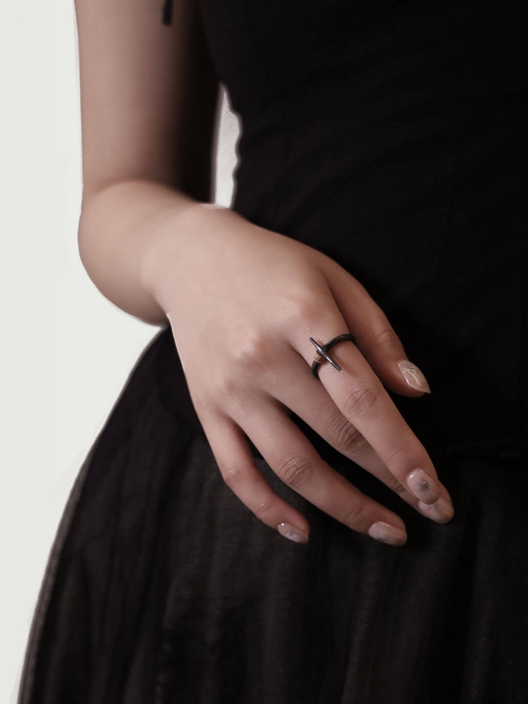 Black cruciform ring