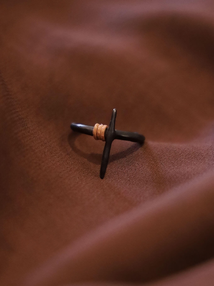 Black cruciform ring