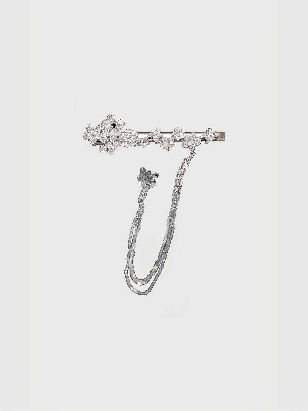 Silver crushed flowers clip and earring - set