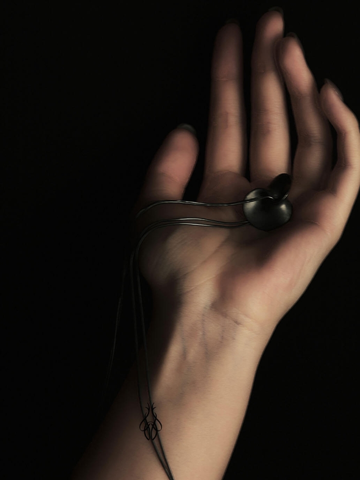 Black wormhole pendant necklace